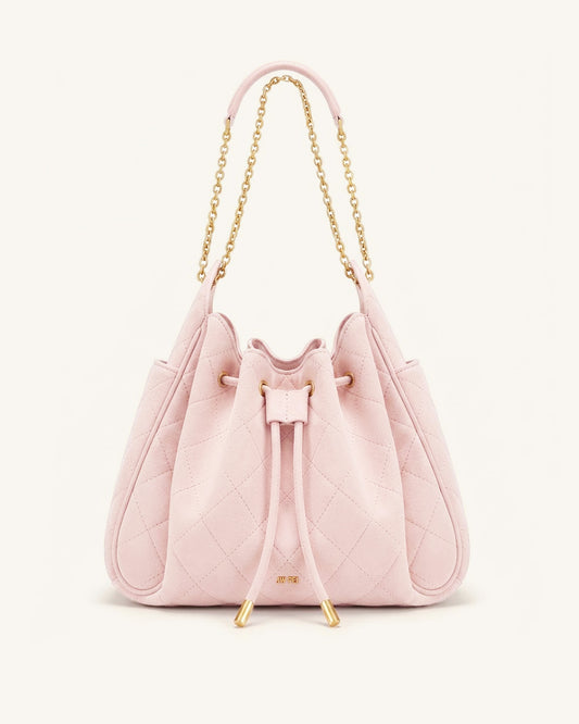 Rowan Sac seau matelassé à chaîne en faux suède - Rose